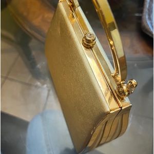Small gold clutch bag